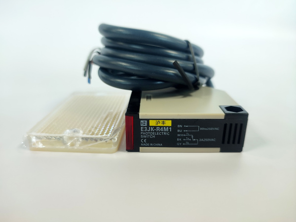 Фотоэлектрический датчик для ламинатора